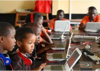 Children learning through computer. Photo/World Vision.