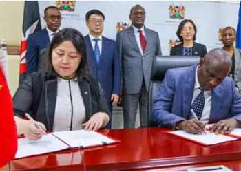 Treasury CS John Mbadi (r) with Ms Zhu Jia (l) during the event in Nairobi. Photo, courtesy.