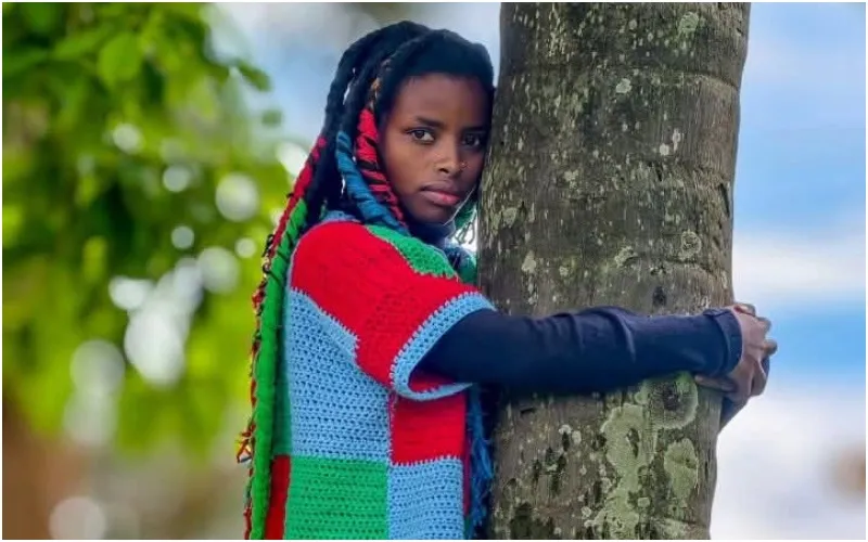 Truphena Muthoni broke the record for a 72-hour continuous tree hug at exactly 12:30 pm. Photo, courtesy.
