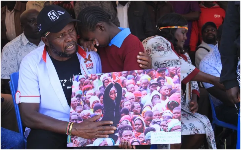 Governor George Natembeya comforts Favour Wangare. Photo: Natembeya Mashinani. Source: Facebook.