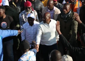 Saboti MP Caleb Amisi, flanked by his supporters, during a recent political event. Photo: Caleb Amisi. Source: Facebook.