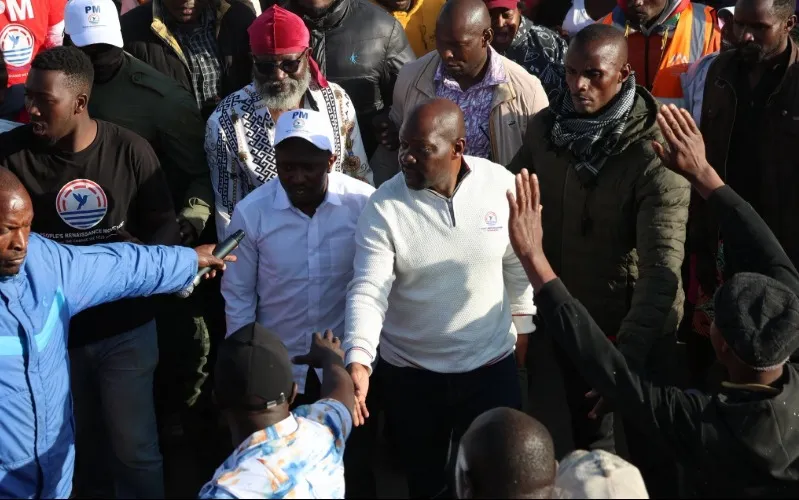 Saboti MP Caleb Amisi, flanked by his supporters, during a recent political event. Photo: Caleb Amisi. Source: Facebook.